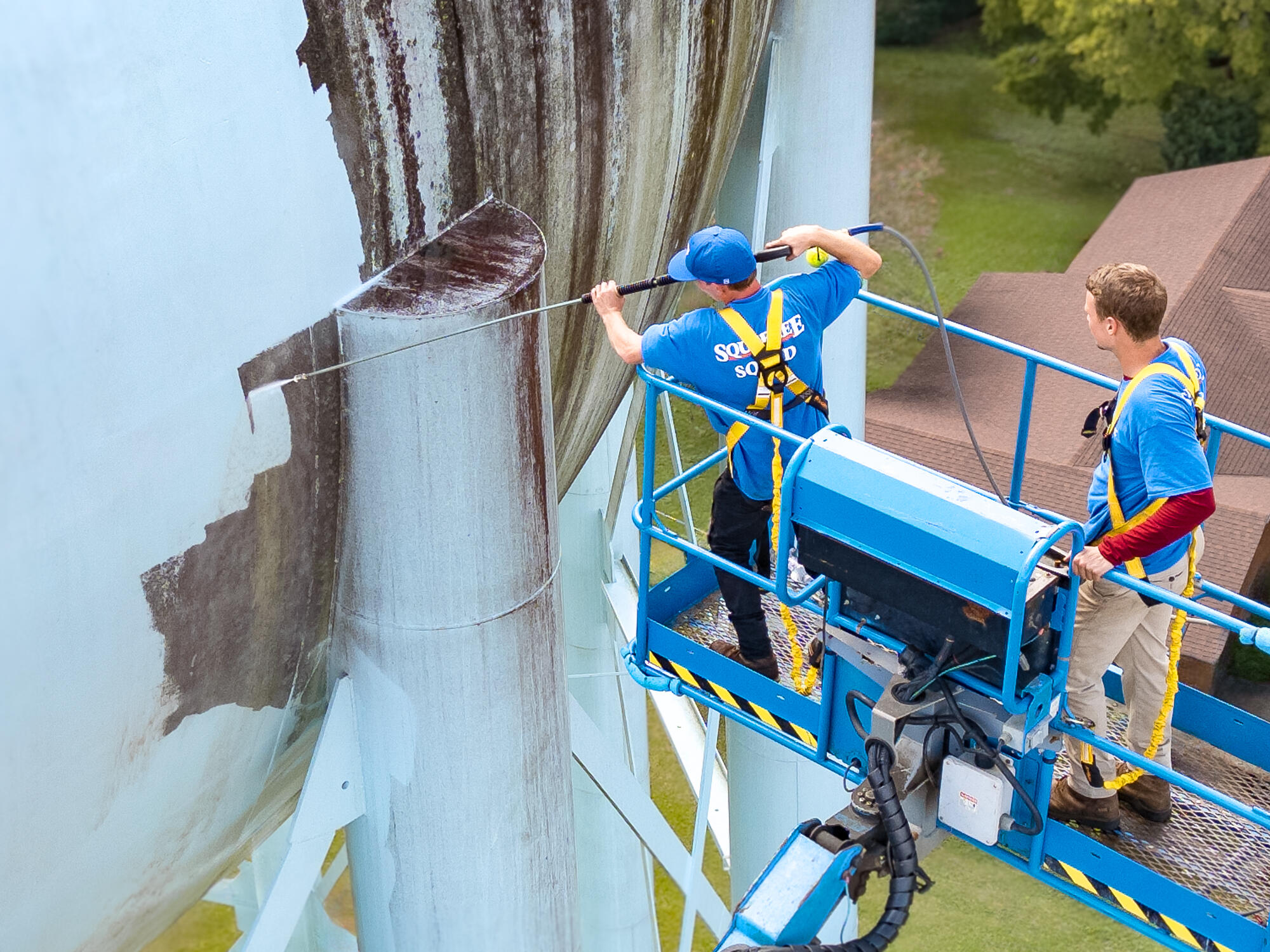 Drone footage of water tank pressure washing Drone footage of water tank pressure washing